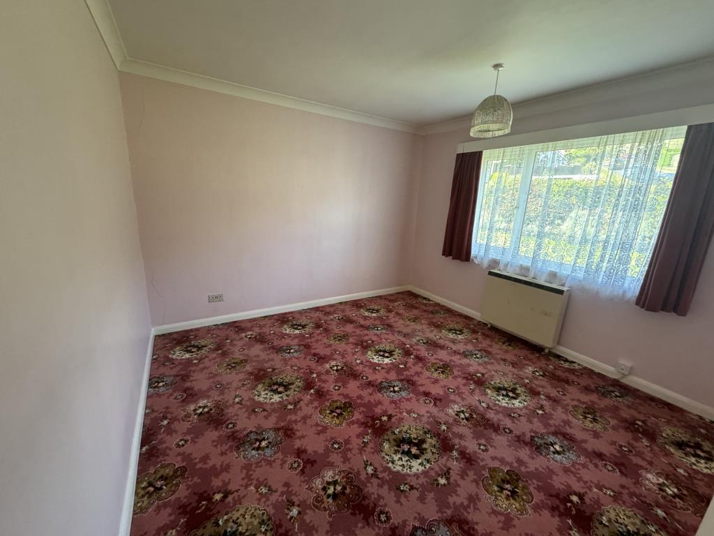 Lot: 131 - DETACHED BUNGALOW REQUIRING MODERNISATION ON A GENEROUS PLOT - View of bedroom one